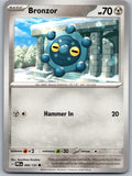 Bronzor 066/131 Prismatic Evolutions Pokemon